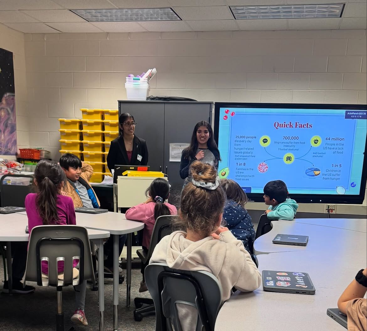 Two Second Harvest leaders present Quick Facts about hunger to young students