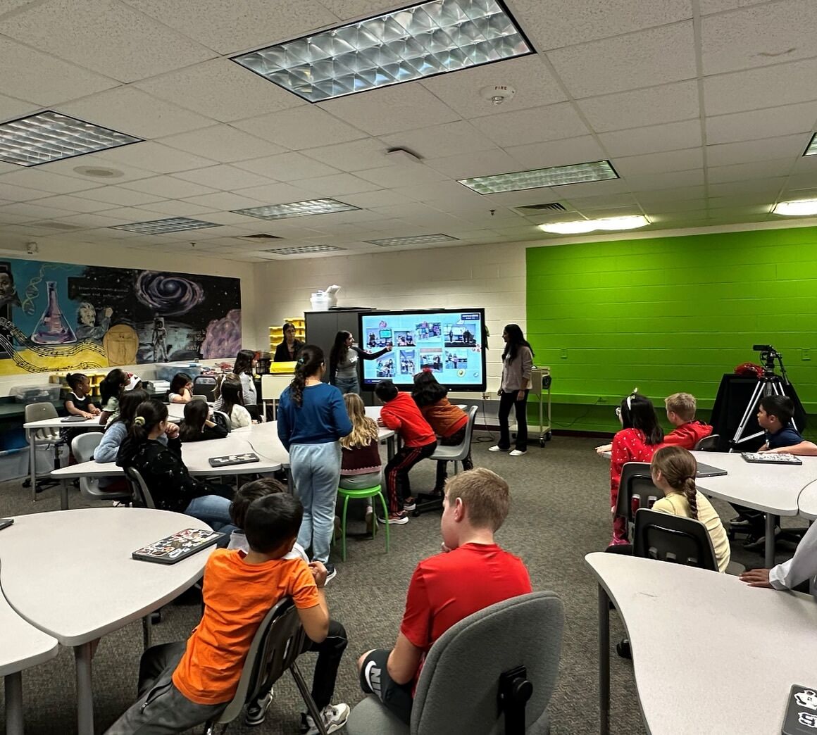 Second Harvest ambassadors present to a full classroom of elementary students